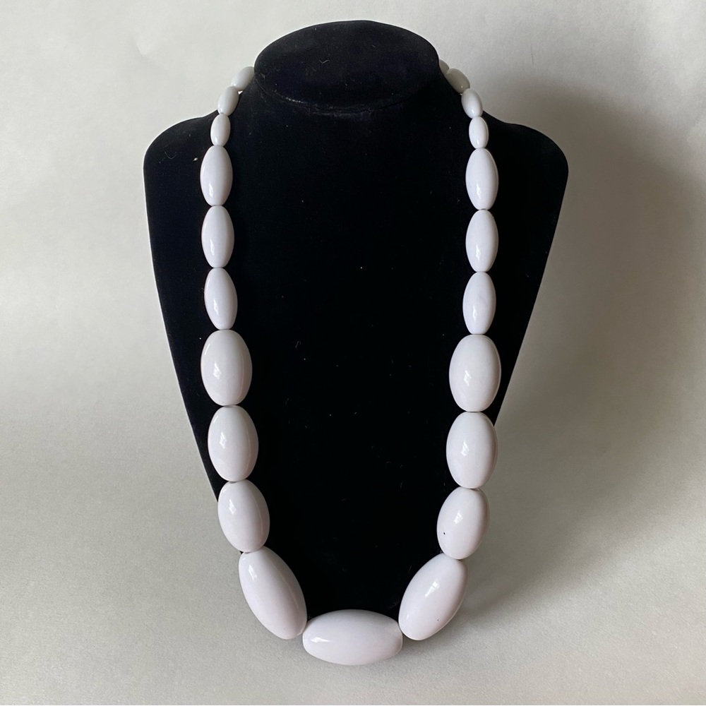 White plastic beaded necklace